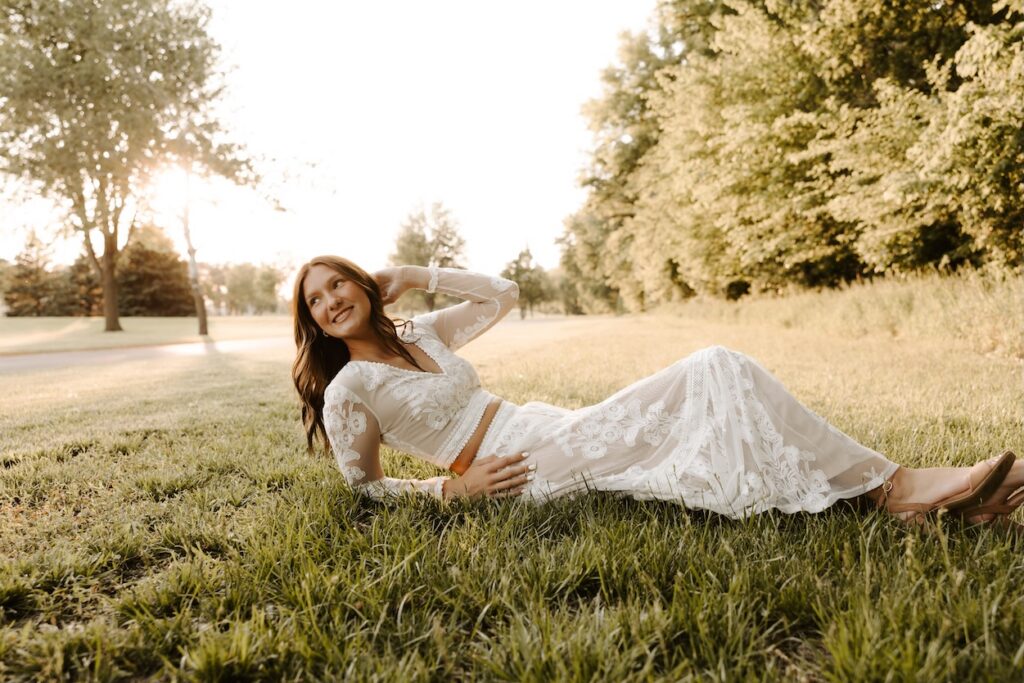 senior posing for a senior photographer